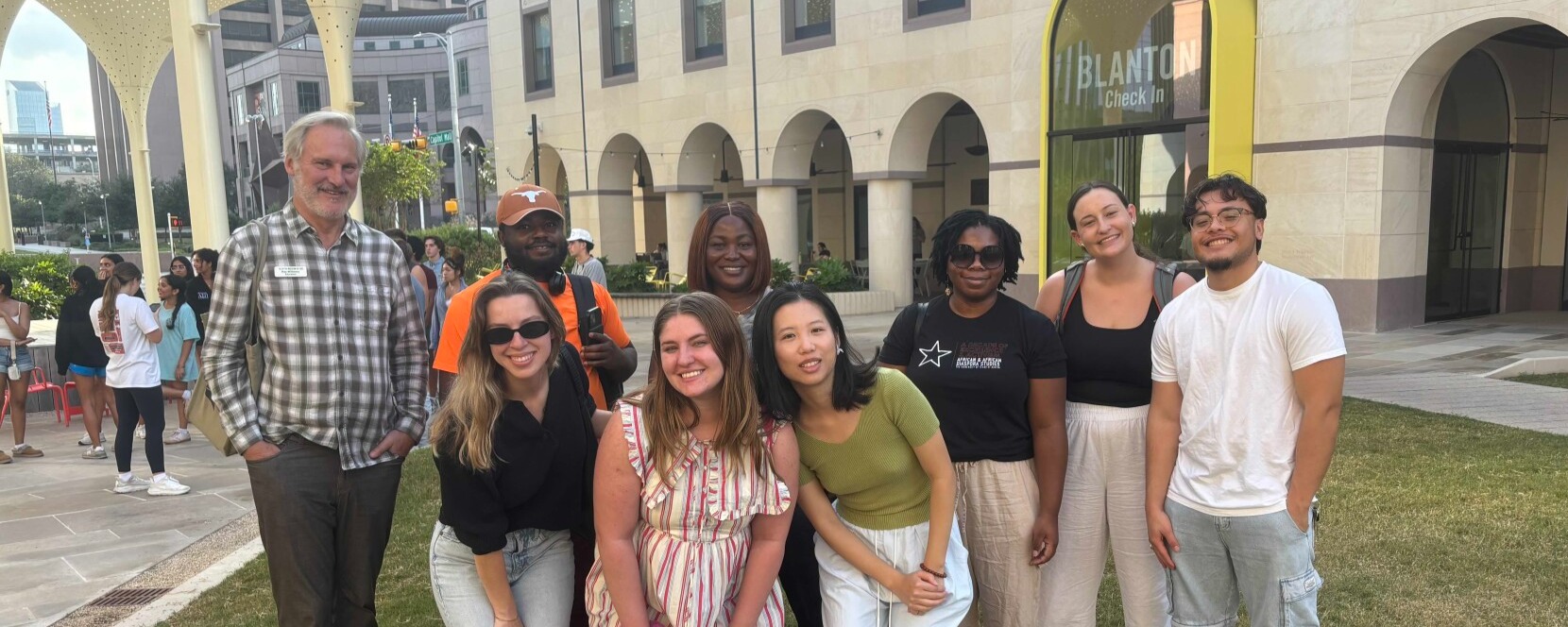 Photograph of a group of HHM Graduate Students in front of the Blanton Museum