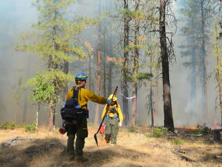 Firefighters get ready to respond to a wildfire.