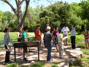 Geography students and faculty examine canals