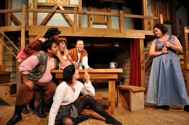 Maria explaining a plot to dupe Malvolio in the 40th season of Shakespeare at Winedale's performance of Twelfth Night.