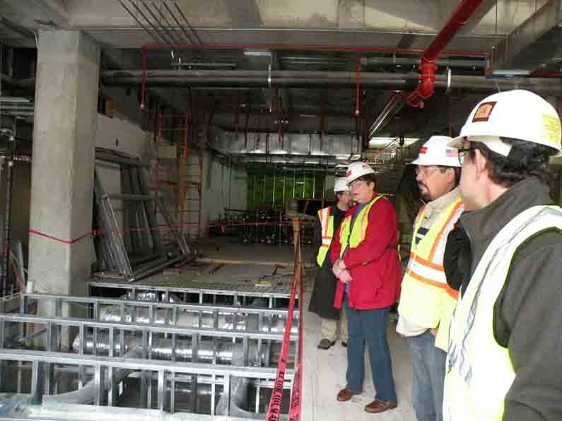 Staff and faculty tour new building to be completed fall 2012