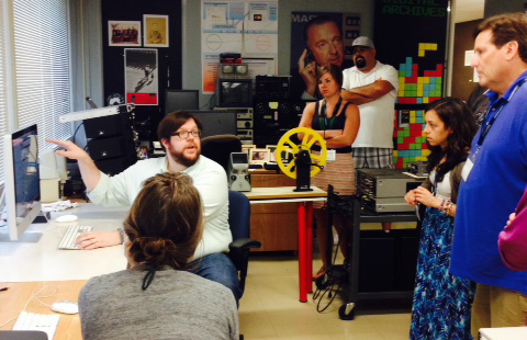 Archivist Justin Kovar introduces the Briscoe center's digitization projects and equipment. Photo courtesy of Brenda Gunn, Dolph Briscoe Center for American History.
