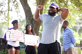 Houston spoken word artist Willy Showtime performs at a memorial for Sandra Bland on the anniversary of her arrest in Prairie View, Texas. Photo: Patrick Michels
