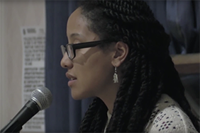 Ariana Brown performing at the 2014 College Unions Poetry Slam semifinals at UT-Austin