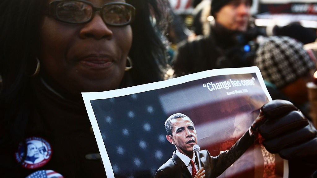 Large crowds watch the inauguration of Barack Obama as the 44th president of the United States on January 20, 2009, in New York City. (Photo by Chris McGrath/Getty Images)
